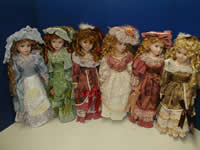 15 Inch porcelain and cloth body dolls